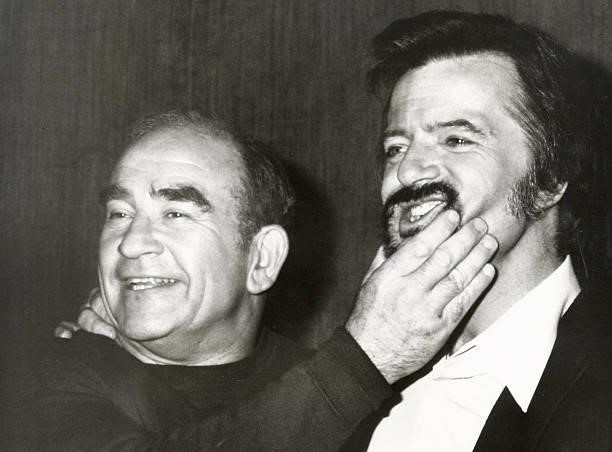 Ed Asner and Robert Goulet during "Because We Care