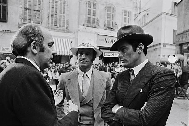 French actors Jean-Paul Belmondo, Alain Delon and director Jacques Deray on the set of gangster movie Borsalino in 1970 in Paris, France.