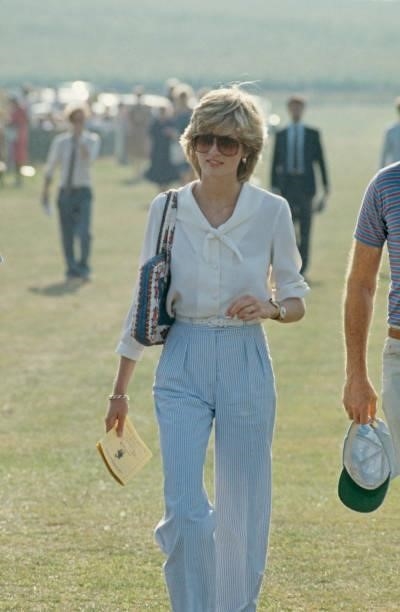 Diana, Princess of Wales attends a polo match at Cowdray Park Polo Club in West Sussex on her second wedding anniversary, 29th July 1983.
