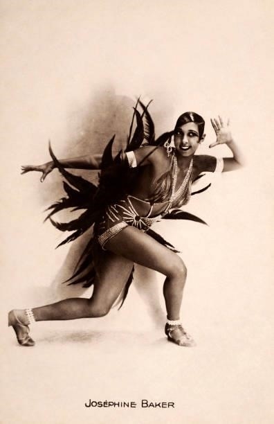 Vintage postcard featuring the American-born French entertainer Josephine Baker who was an icon of the 1920's Jazz Age, circa 1928. Baker headlined...