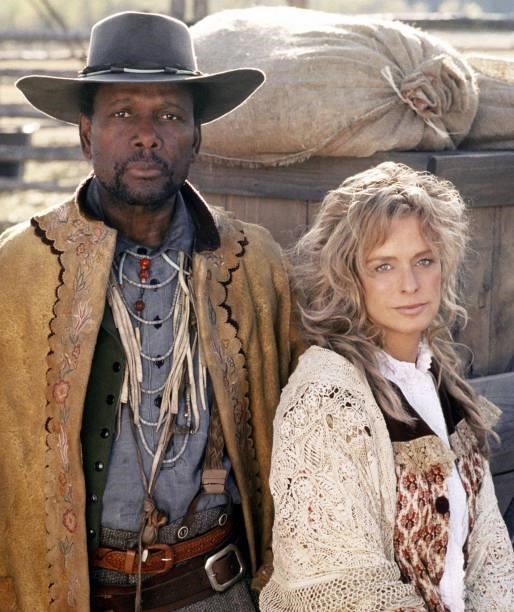 Sidney Poitier as Gypsy Smith and Farrah Fawcett as Nora Maxwell in the CBS television network's made-for-TV miniseries, "Children of the Dust.