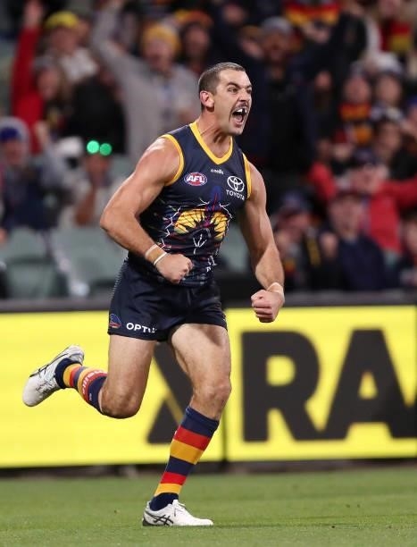 Taylor Walker of the Crows celebrates a goal during the 2021 AFL Round 12 match between the Adelaide Crows and the Collingwood Magpies at Adelaide...