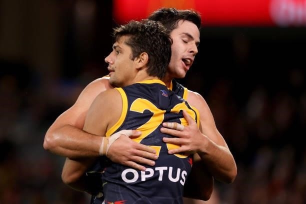 Shane McAdam and Darcy Fogarty of the Crows celebrate a goal during the 2021 AFL Round 12 match between the Adelaide Crows and the Collingwood...