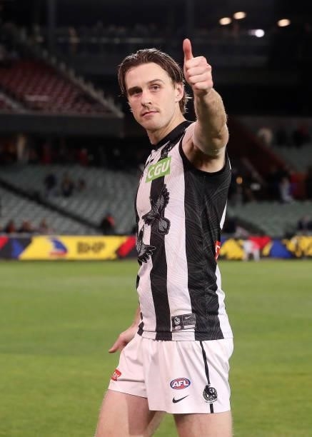 Jordan Roughead of the Magpies reacts towards the crowd after the win during the 2021 AFL Round 12 match between the Adelaide Crows and the...