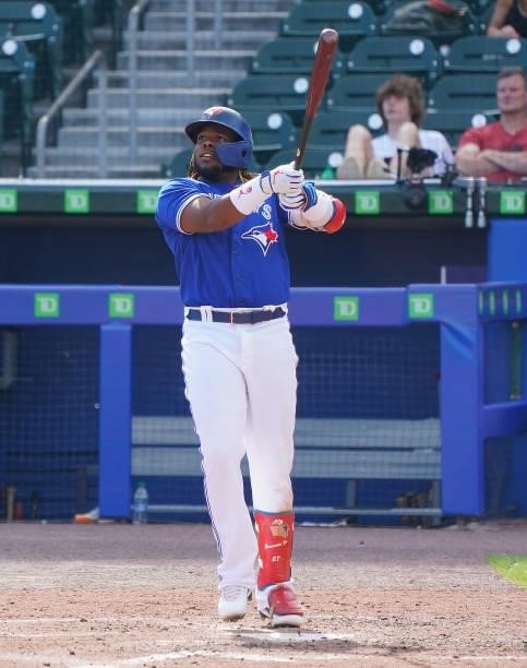 Vladimir Guerrero Jr. #27 of the Toronto Blue Jays watches his two run home run during the fifth inning against the Houston Astros at Sahlen Field on...