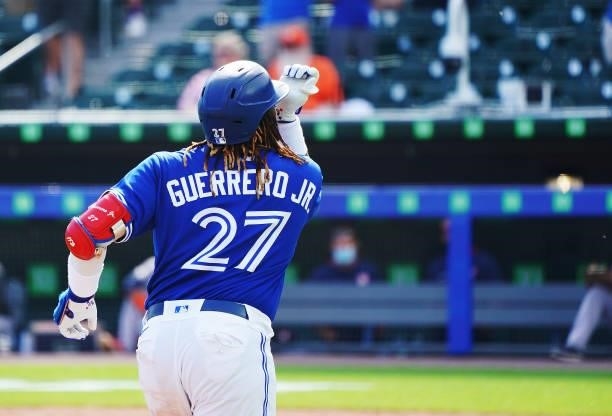 Vladimir Guerrero Jr. #27 of the Toronto Blue Jays celebrates after hitting a two run home run during the fifth inning against the Houston Astros at...
