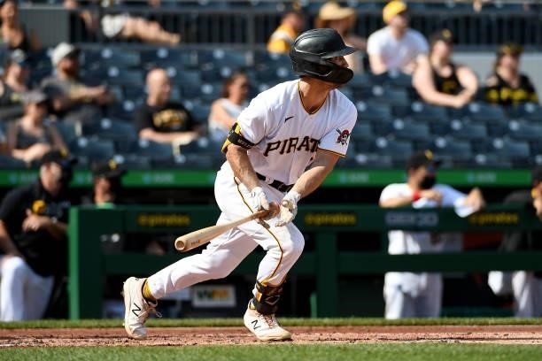 Adam Frazier of the Pittsburgh Pirates hits a two-run RBI single to left field in the second inning during the game against the Miami Marlins at PNC...