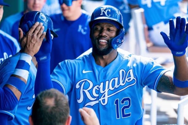 Michael A. Taylor of the Kansas City Royals celebrates with the team after scoring against the Minnesota Twins in the second inning at Kauffman...
