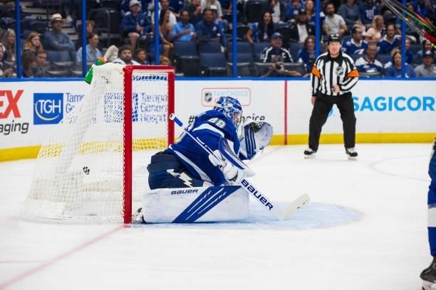 Goalie Andrei Vasilevskiy of the Tampa Bay Lightning gives up a goal against the Carolina Hurricanes during the second period in Game Four of the...