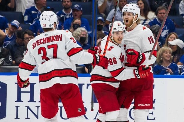 The Carolina Hurricanes celebrate a goal by Dougie Hamilton against the Tampa Bay Lightning during the second period in Game Four of the Second Round...