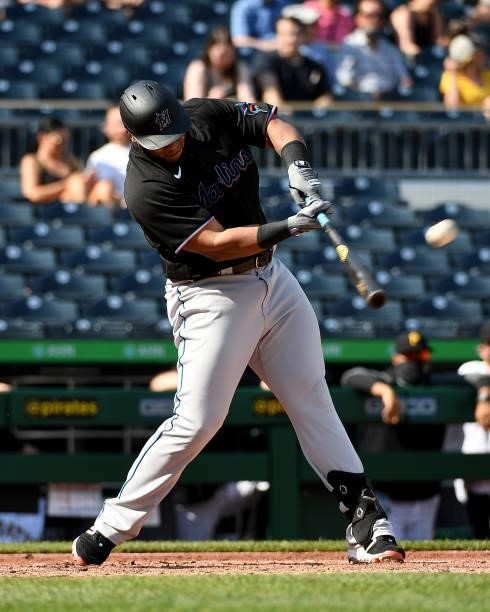Jesus Aguilar of the Miami Marlins hits a solo home run in the fourth inning during the game against the Pittsburgh Pirates at PNC Park on June 5,...