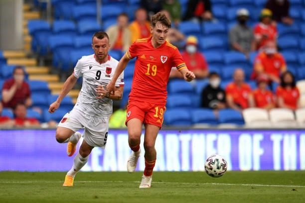 David Brooks of Wales under pressure from Lorenc Trashi of Albania during the International Friendly Match between Wales and Albania at the Cardiff...