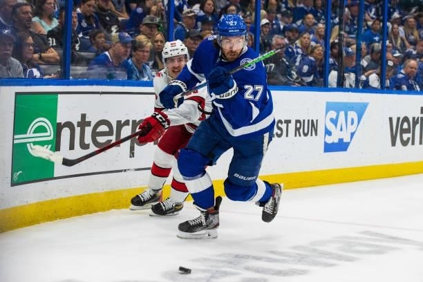 Ryan McDonagh of the Tampa Bay Lightning skates against Martin Necas of the Carolina Hurricanes during the second period in Game Four of the Second...