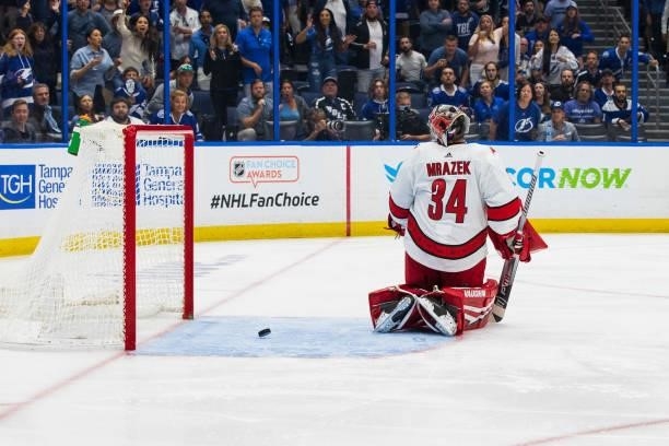 Goalie Petr Mrazek of the Carolina Hurricanes gives up a goal against the Tampa Bay Lightning during the third period in Game Four of the Second...