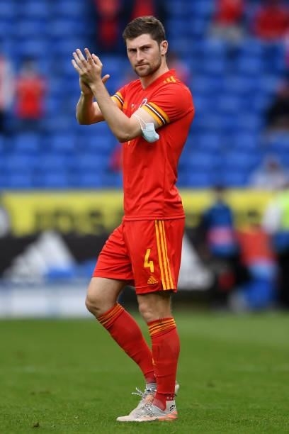 Ben Davies of Wales applauds the fans at the final whistle during the International Friendly Match between Wales and Albania at the Cardiff City...