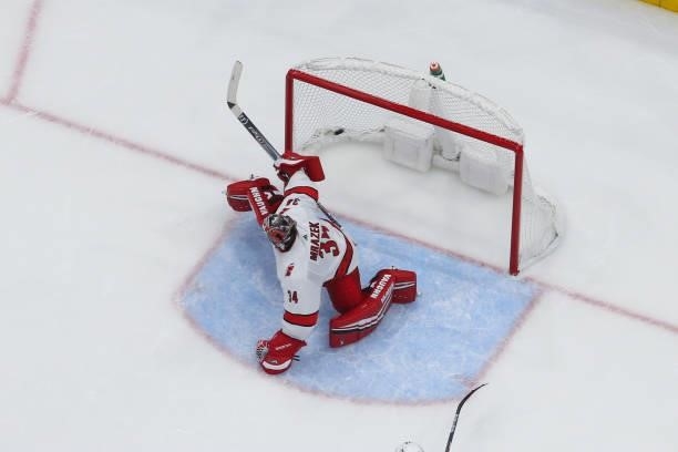 Goalie Petr Mrazek of the Carolina Hurricanes gives up a goal against the Tampa Bay Lightning during the second period in Game Four of the Second...