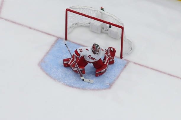 Goalie Petr Mrazek of the Carolina Hurricanes gives up a goal against the Tampa Bay Lightning during the second period in Game Four of the Second...