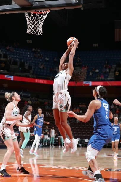 Betnijah Laney of the New York Liberty leaps for the ball against the Connecticut Sun on June 5, 2021 at Mohegan Sun Arena in Uncasville,...