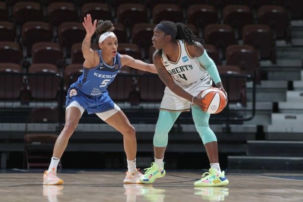 Jazmine Jones of the New York Liberty handles the ball against the Connecticut Sun on June 5, 2021 at Mohegan Sun Arena in Uncasville, Connecticut....