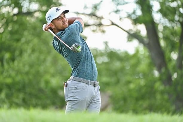 Xander Schauffele hits a tee shot on the 18th hole during the third round of the Memorial Tournament presented by Nationwide at Muirfield Village...