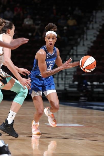 Jasmine Thomas of the Connecticut Sun handles the ball against the New York Liberty on June 5, 2021 at Mohegan Sun Arena in Uncasville, Connecticut....