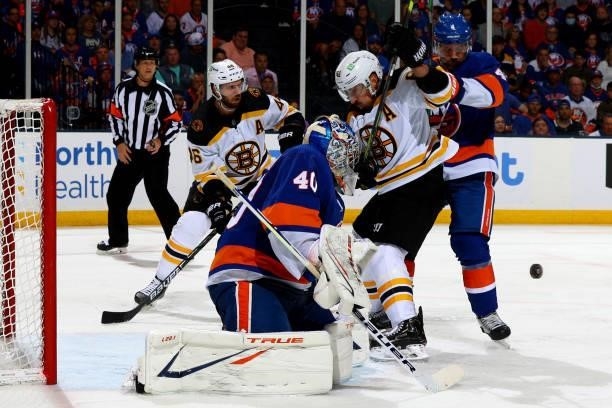 Semyon Varlamov of the New York Islanders eyes the puck as the Boston Bruins take a shot on goal during the second period in Game Four of the Second...