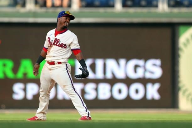 Jean Segura of the Philadelphia Phillies reacts as the fans cheer after turning a double play in the seventh inning during a game against the...