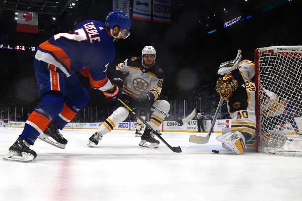 Tuukka Rask of the Boston Bruins makes a save against Jordan Eberle of the New York Islanders during the second period in Game Four of the Second...