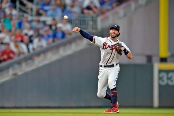 Dansby Swanson of the Atlanta Braves fields a ground ball in the fourth inning against the Los Angeles Dodgers at Truist Park on June 5, 2021 in...