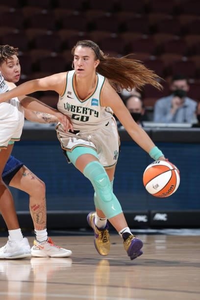 Sabrina Ionescu of the New York Liberty handles the ball against the Connecticut Sun on June 5, 2021 at Mohegan Sun Arena in Uncasville, Connecticut....