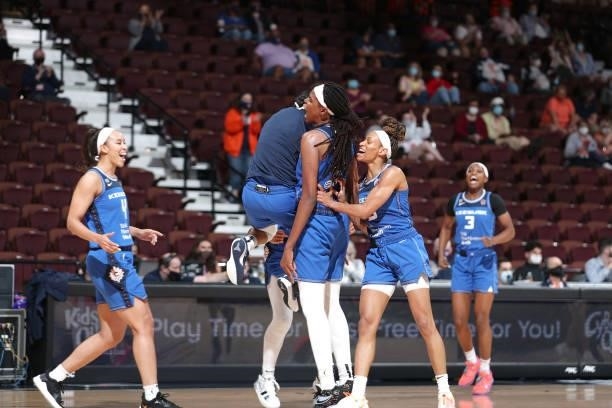 The Connecticut Sun celebrate after the game against the New York Liberty on June 5, 2021 at Mohegan Sun Arena in Uncasville, Connecticut. NOTE TO...