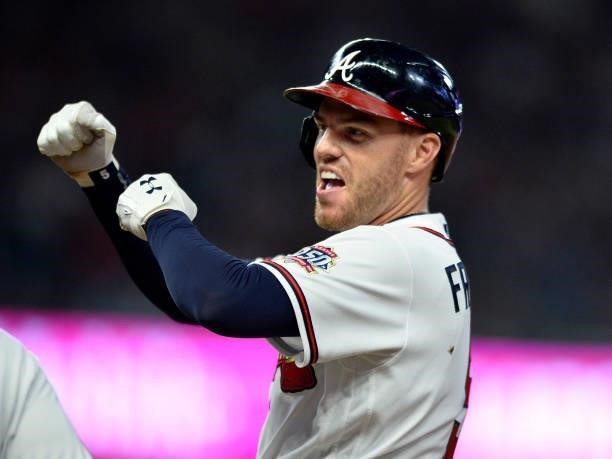 Freddie Freeman of the Atlanta Braves reacts to his base hit in the fifth inning against the Los Angeles Dodgers at Truist Park on June 5, 2021 in...