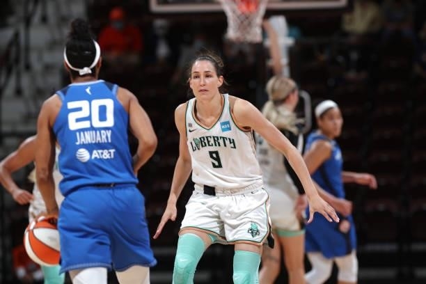 Rebecca Allen of the New York Liberty plays defense on Briann January of the Connecticut Sun on June 5, 2021 at Mohegan Sun Arena in Uncasville,...