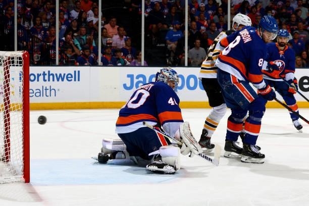 Goaltender Semyon Varlamov of the New York Islanders looks on as the Boston Bruins attempt a shot on goal during the second period in Game Four of...