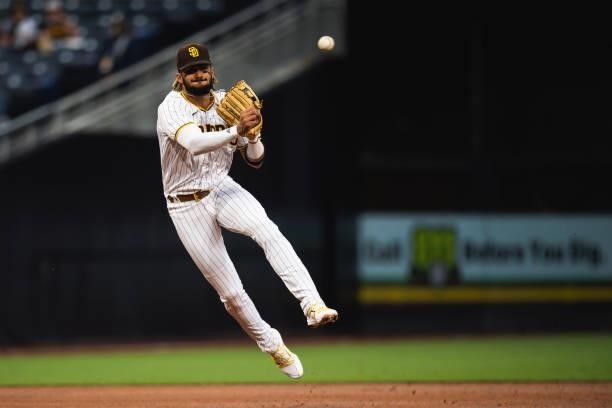 Fernando Tatis Jr. #23 of the San Diego Padres fields and throws the ball in the second inning against the New York Mets at Petco Park on June 5,...