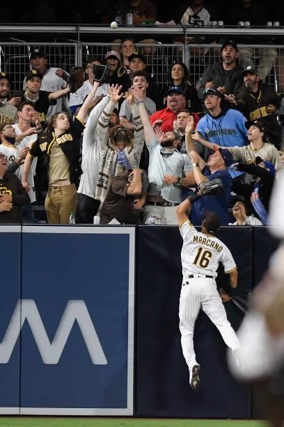 Tucupita Marcano of the San Diego Padres fails to make the catch on a solo home run by Jose Peraza of the New York Mets during the fifth inning of a...