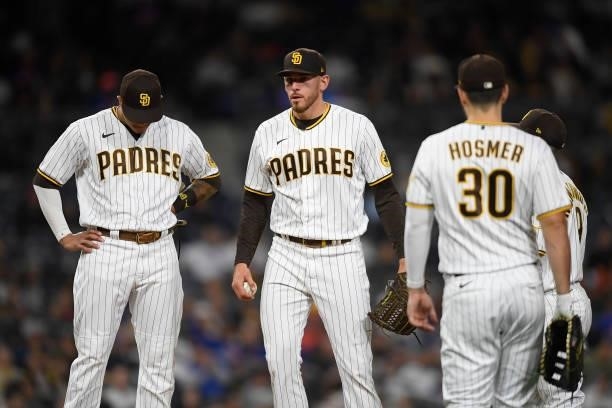 Joe Musgrove of the San Diego Padres stands on the mound before leaving the game during the fifth inning of a baseball game against New York Mets at...