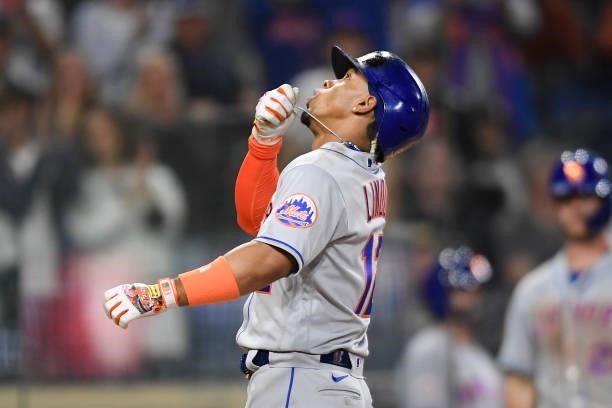 Francisco Lindor of the New York Mets celebrates after hitting a solo home run during the fifth inning of a baseball game against San Diego Padres at...