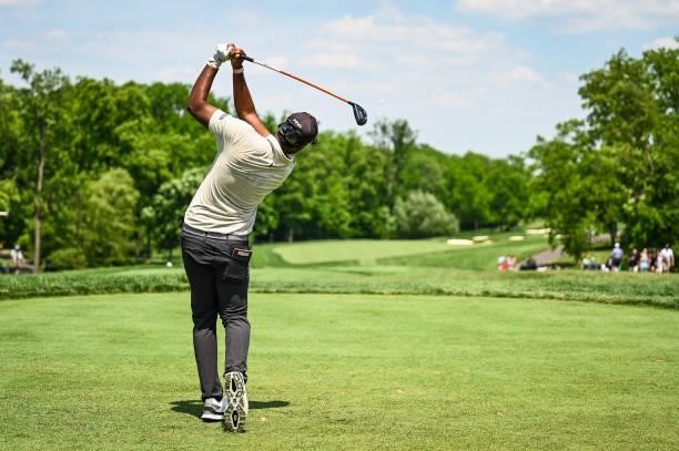 Sahith Theegala follows through as he plays his shot from the first tee during the third round of the Memorial Tournament presented by Nationwide at...