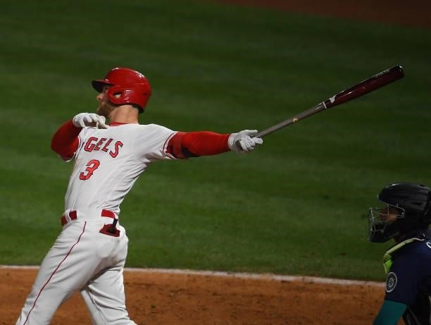 Taylor Ward of the Los Angeles Angels hits a two-run home run in the sixth inning of the game against the Seattle Mariners at Angel Stadium of...