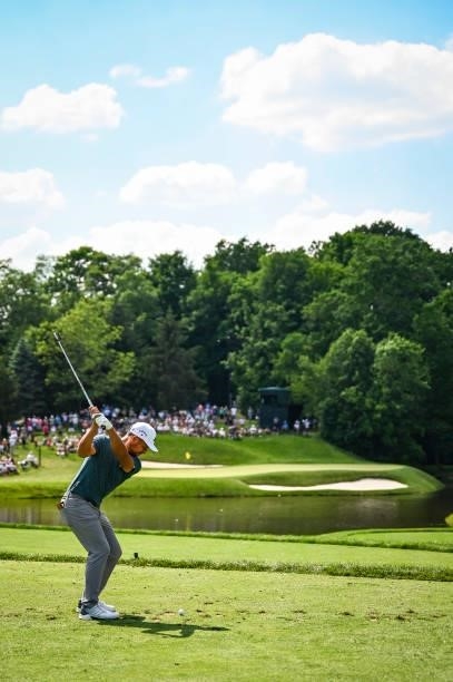 Xander Schauffele at the top of his swing as he plays his shot from the 12th tee during the third round of the Memorial Tournament presented by...