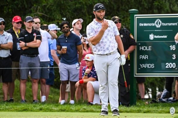 Jon Rahm of Spain reacts after playing his shot from the 16th tee during the third round of the Memorial Tournament presented by Nationwide at...
