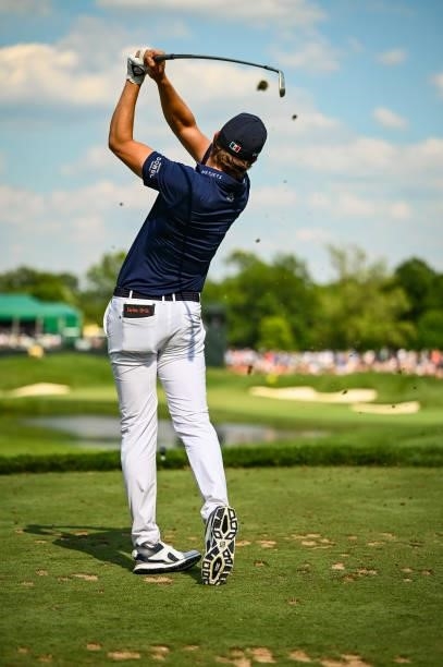 Carlos Ortiz of Mexico follows through as he plays his shot from the 16th tee during the third round of the Memorial Tournament presented by...