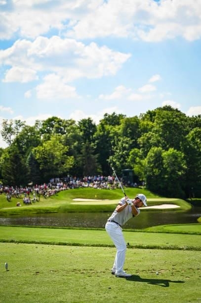 Patrick Cantlay at the top of his swing as he plays his shot from the 12th tee during the third round of the Memorial Tournament presented by...