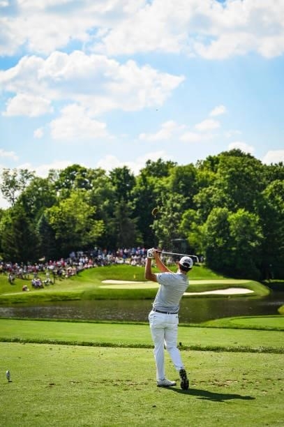 Patrick Cantlay follows through as he plays his shot from the 12th tee during the third round of the Memorial Tournament presented by Nationwide at...