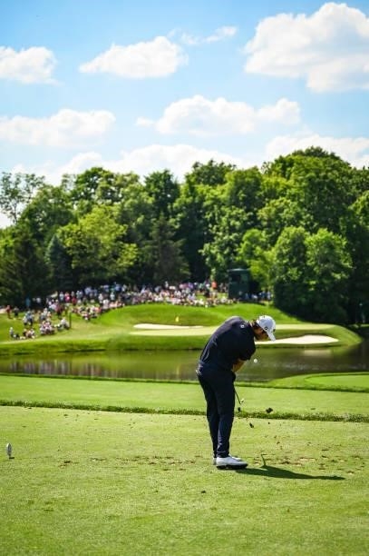 Max Homa makes impact as he plays his shot from the 12th tee during the third round of the Memorial Tournament presented by Nationwide at Muirfield...