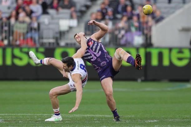 Stefan Martin of the Bulldogs contests a ruck against Brennan Cox of the Dockers during the 2021 AFL Round 12 match between the Fremantle Dockers and...