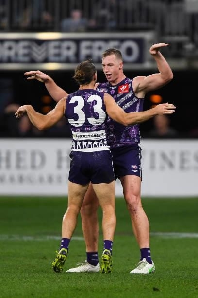 Josh Treacy of the Dockers celebrates a goal during the 2021 AFL Round 12 match between the Fremantle Dockers and the Western Bulldogs at Optus...