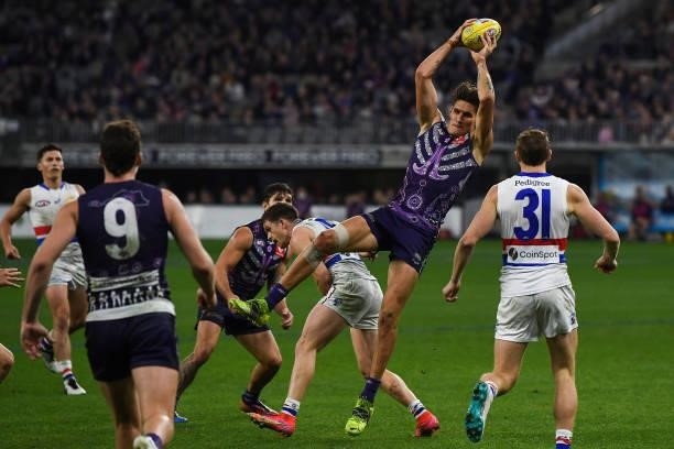 Rory Lobb of the Dockers marks the ball during the 2021 AFL Round 12 match between the Fremantle Dockers and the Western Bulldogs at Optus Stadium on...