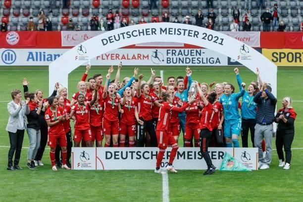 The team of FC Bayern Muenchen celebrate after winning the championship at the FLYERALARM Frauen Bundesliga match between FC Bayern Muenchen and...